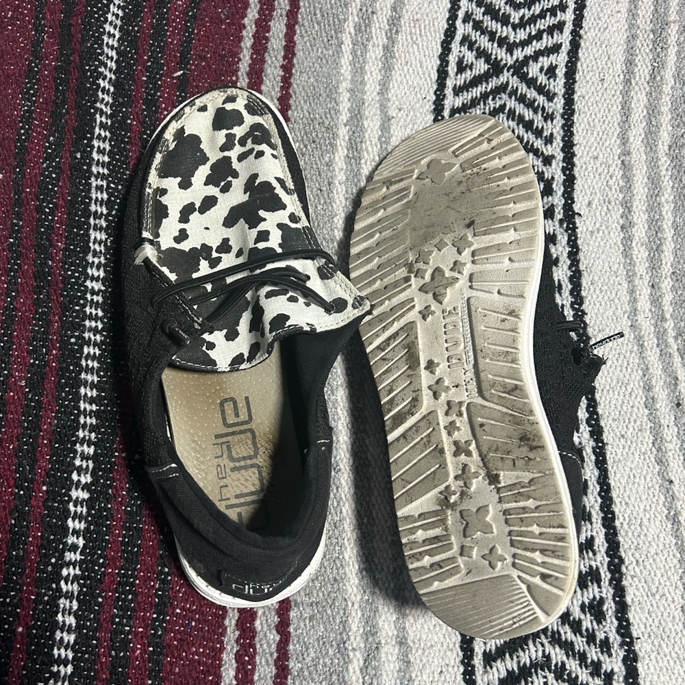 Cow print hey dudes size 10 a little worn but only 3 times